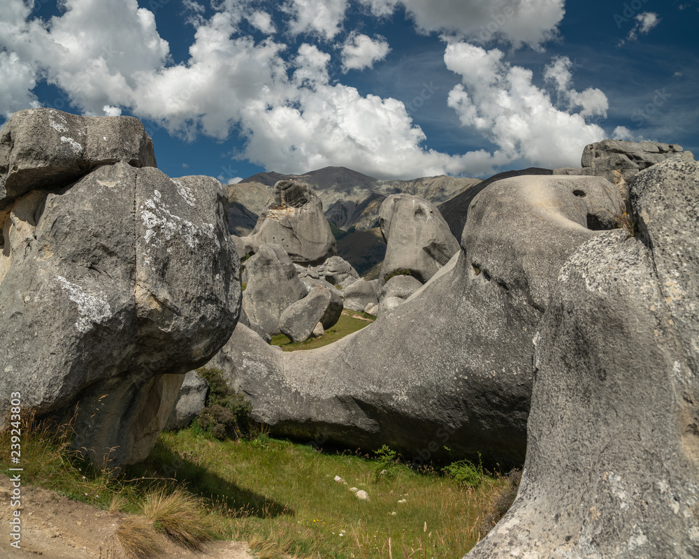 Limestone boulders and dramatic cloudy sky, Castle Hill, New Zealand