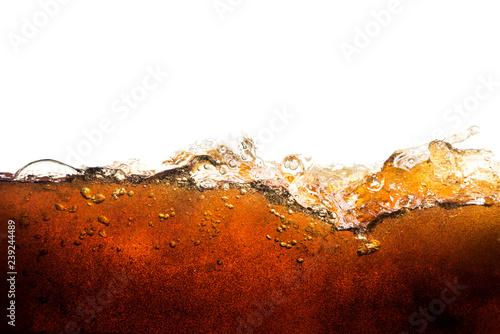 cola soda with sparkling bubbles isolated on white