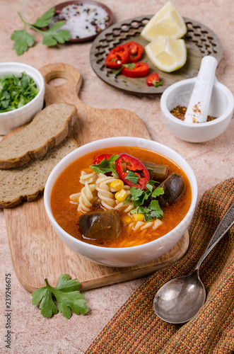 Thick red soup with pasta