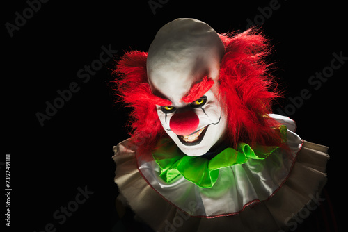 Photography Scary clown on a dark background