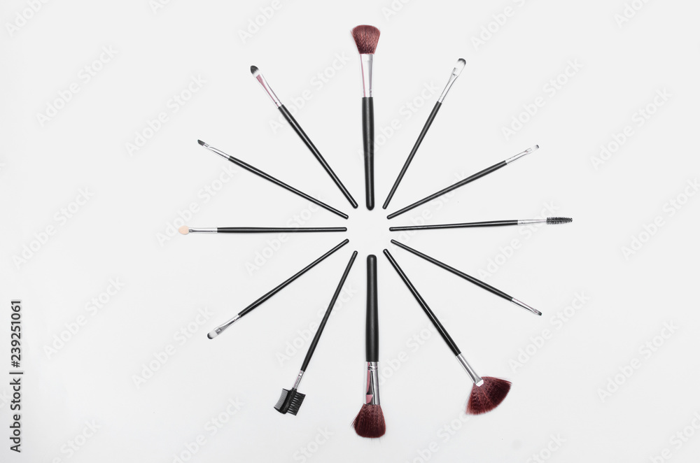 Make up brushes set isolated on the gray background. Make up brushes set isolated on the gray background.