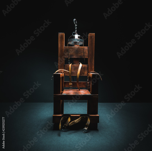 Electric chair in a dark background