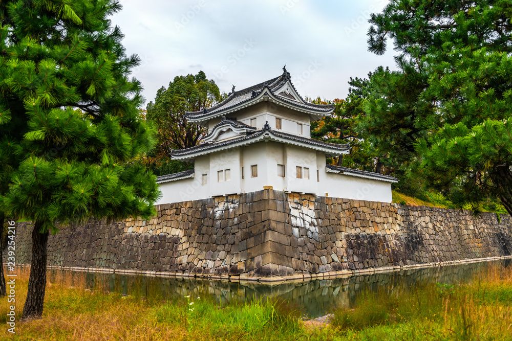 beautiful Nijo castle with water in moat, autumn in Kyoto, Japan