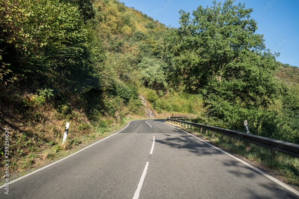a road along the mountain