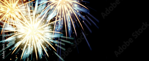 abstract group of fireworks explosion on black background with space for happy new year celebrate 2019 © chinnarach