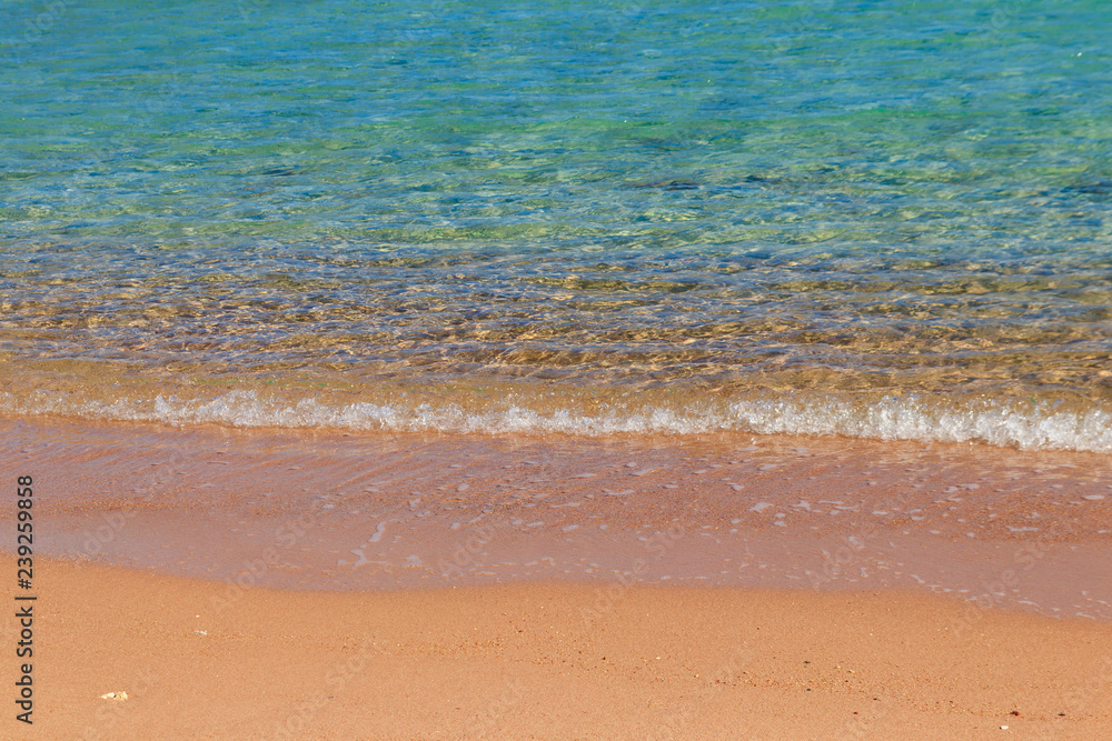 Soft wave of sea on sandy beach