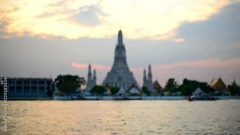 Focus to Wat Arun Ratchawararam Ratchawaramahawihan with lighting public landmark in sunset time Focus to Wat Arun Ratchawararam Ratchawaramahawihan with lighting public landmark in sunset time