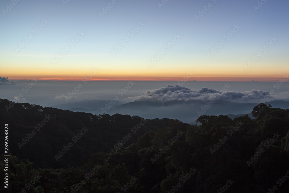 Naklejka premium Fog covering the mountain