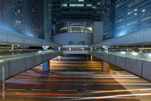 Exterior of modern office building in midtown of Hong Kong city at night © leeyiutung
