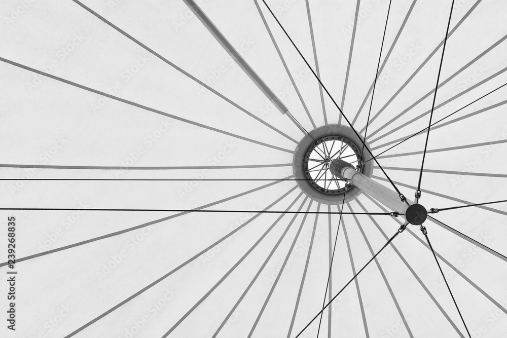 white fabric tensile roof, canvas roof and steel structure background in greyscale tone white fabric tensile roof, canvas roof and steel structure background in greyscale tone