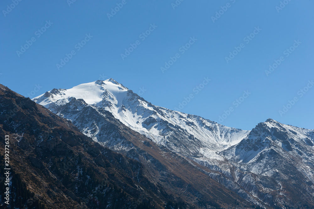 Snow-capped peaks in the mountains of Almaty
