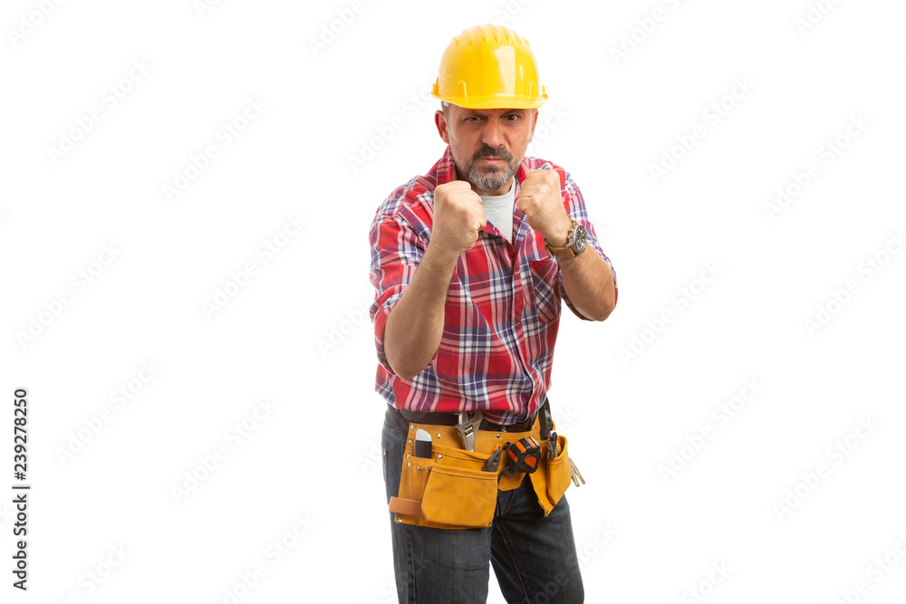 Builder threatening with fists. Builder threatening with fists.
