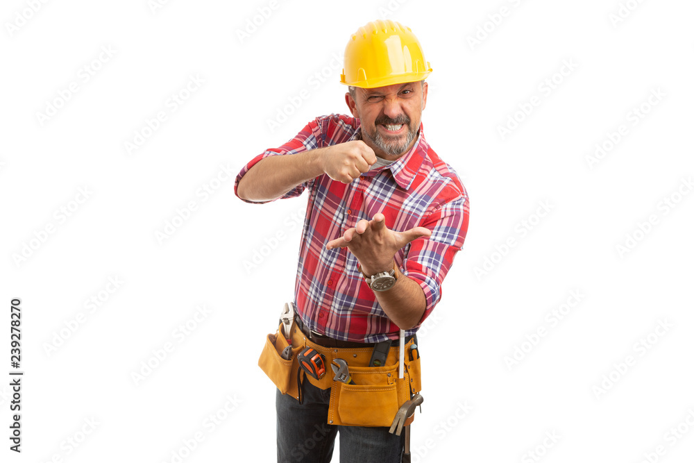 Builder smashing invisible object in palm. Builder smashing invisible object in palm.