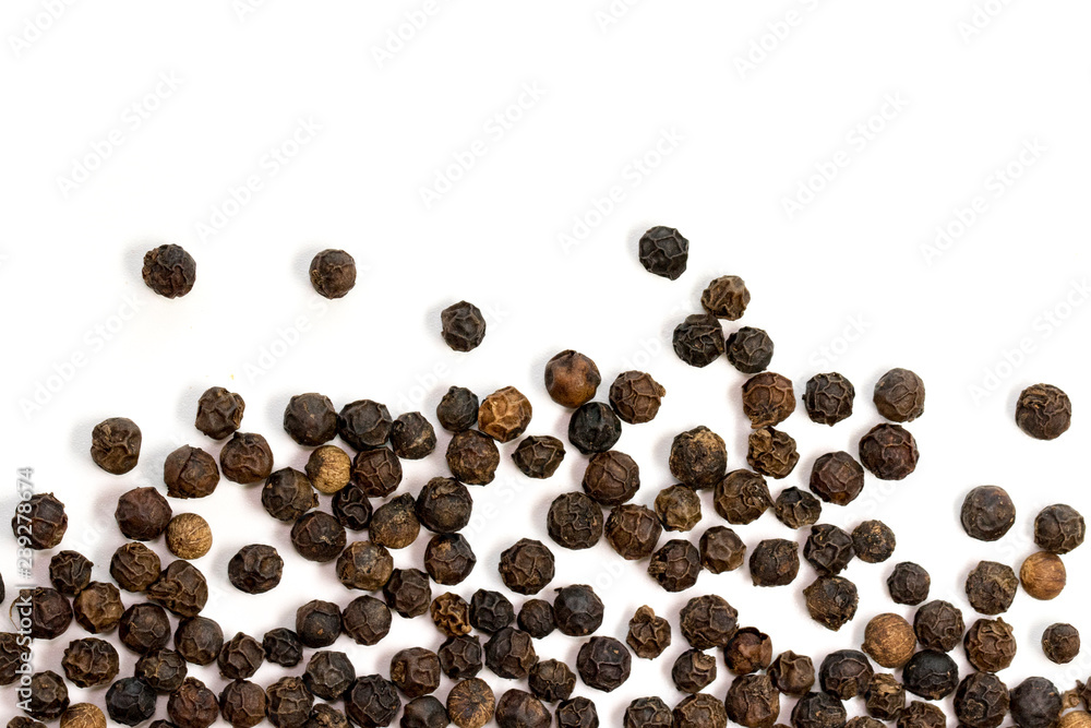 image of black pepper seeds on white background. Food. image of black pepper seeds on white background. Food.