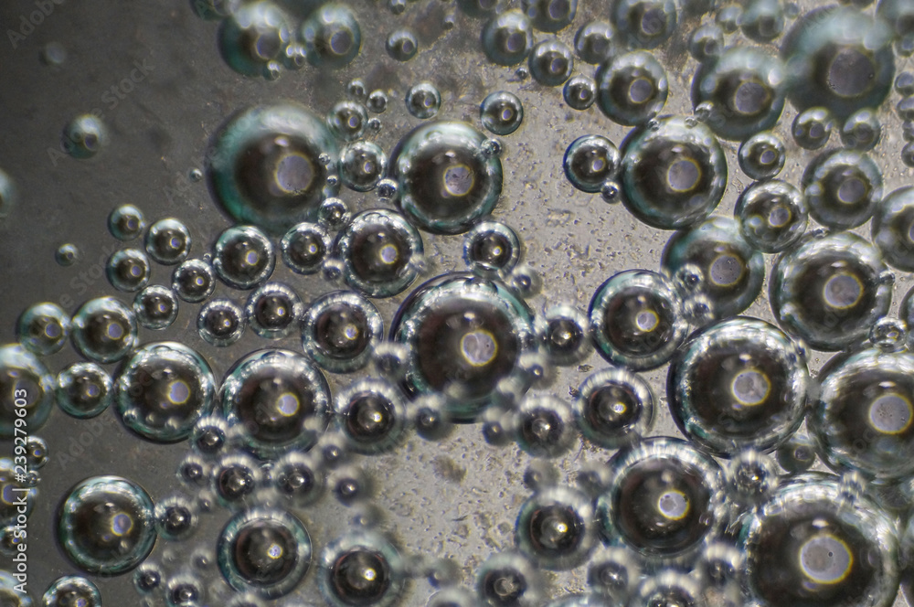 Bubble in liquid background. Macro close up