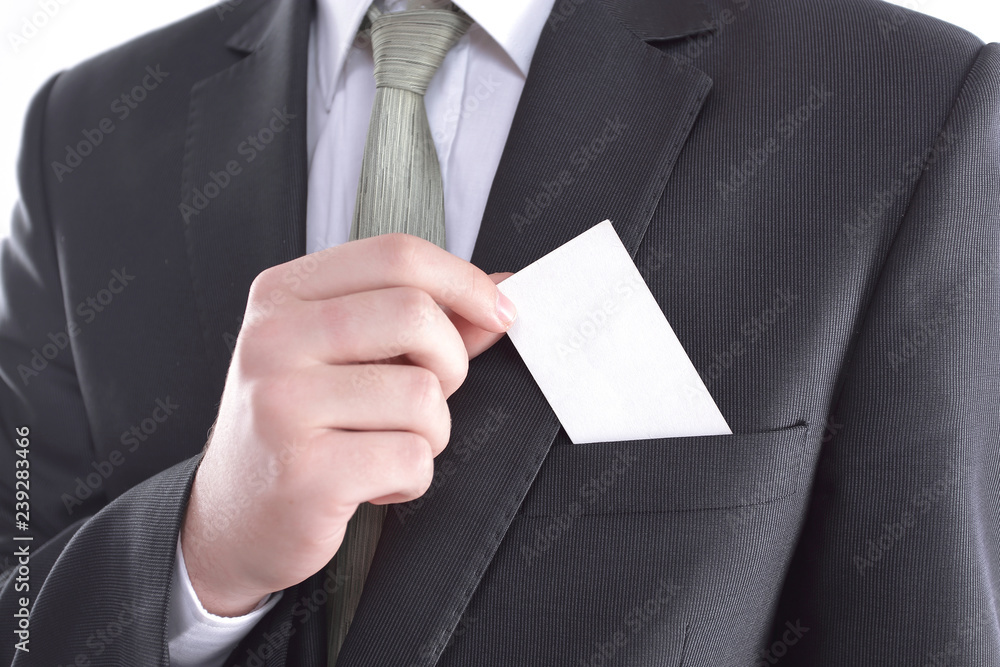 close up.businessman with a business card form close up.businessman with a business card form