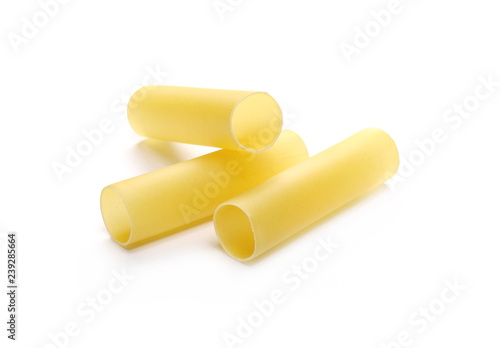Italian uncooked cannelloni pasta tubes isolated on white background photo