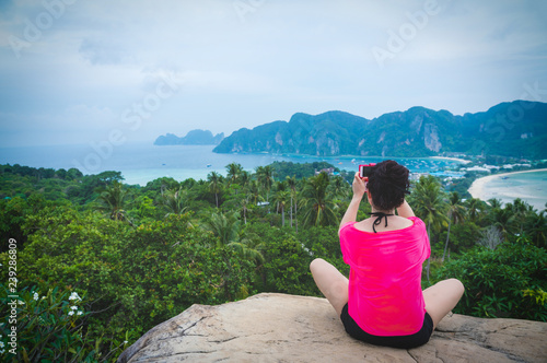 Woman on Beautiful Tropical Beach PP Island, Krabi, Phuket, Thaialnd blue ocean background girl items vacation accessories for holiday or long weekend a guide choice idea for planning travel