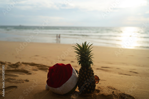 Concept Christmas on the beach with sun shining,prayed for blessings,natural, creative, tropical style background made in Phuket, Thailand.