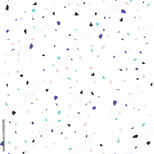 Terrazzo flooring textured surface modern abstract pattern. Vector seamless abstract repeat with chips of marble or granite in soft pastel  colors.