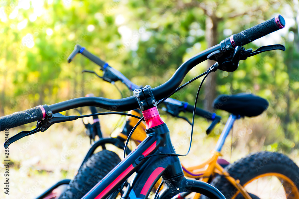 Image close up to bicycles. And focus bike hand. Image close up to bicycles. And focus bike hand.
