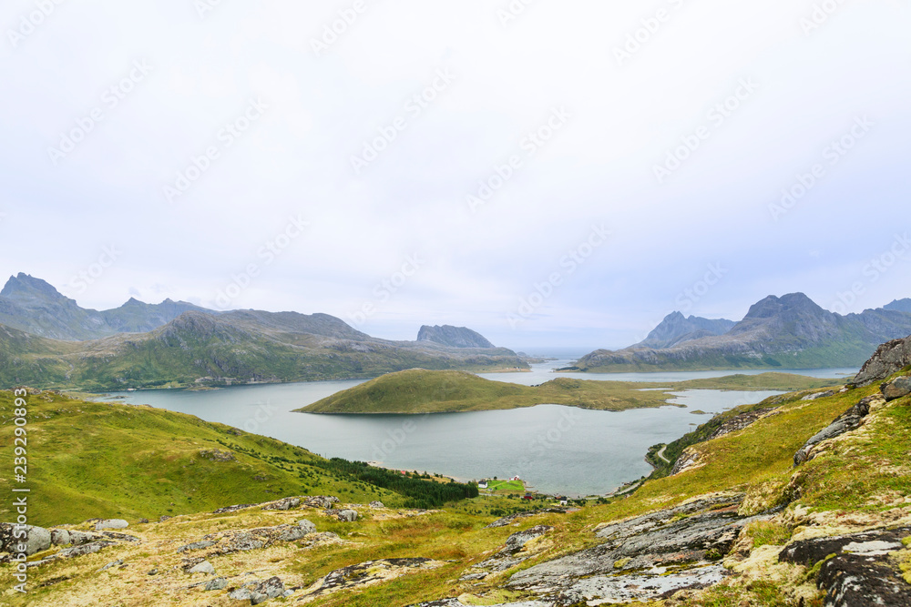 Panoramic beautiful summer view of Kvalvika beach trail head, Lofoten islands, Norway Panoramic beautiful summer view of Kvalvika beach trail head, Lofoten islands, Norway