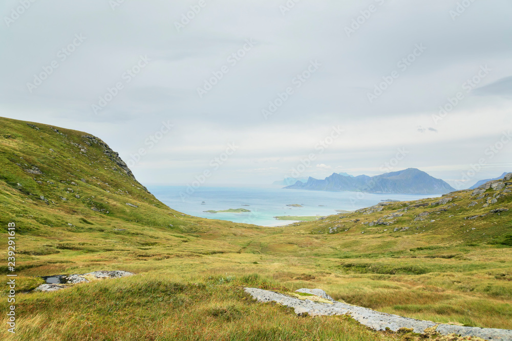 Panoramic summer view of Lofoten Islands on the way to Ryten mountain. Lofoten islands, Norway