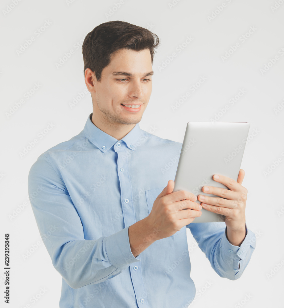 Happy business man using tablet. Happy business man using tablet.