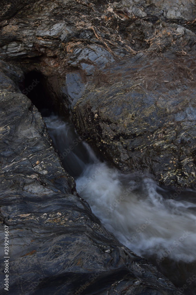 Naklejka premium Sea Cave entrance Maenpoth Beach Falmouth Cornwall