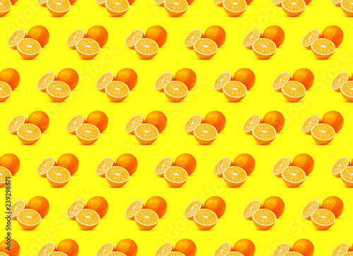 Seamless Pattern of Orange Fruits on Yellow Background. Natural Citrus Pop Art Background, High Resolution Photography 