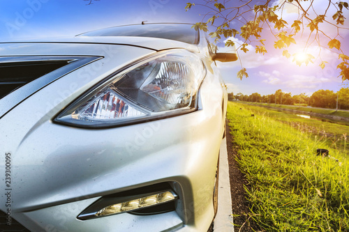Car Blonde traveling in nature on an asphalt road 
