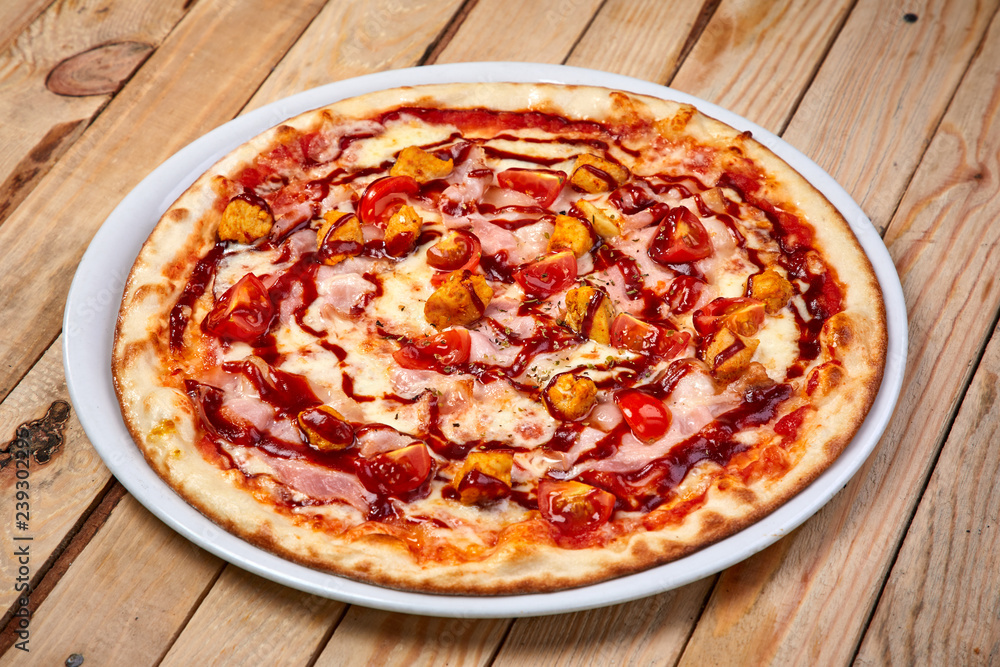 pizza on the wooden background