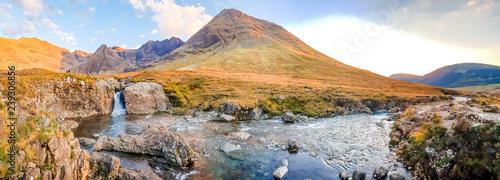The Fairy Pools in front of the Black Cuillin Mountains on the Isle of Skye - Scotland photo