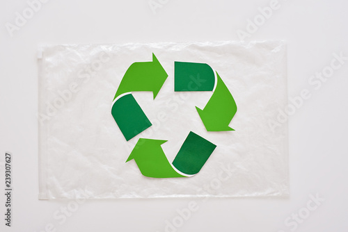 Save futute planet. Isolated recycle symbol on package photo