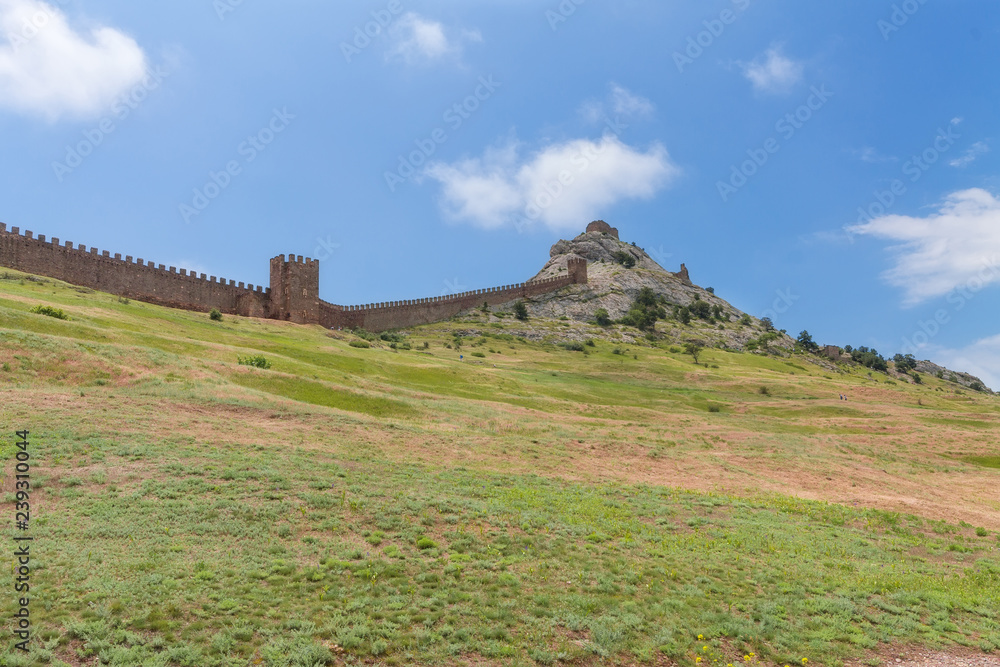 wall of ancient fortress / bright summer landscape travel Crimea wall of ancient fortress / bright summer landscape travel Crimea