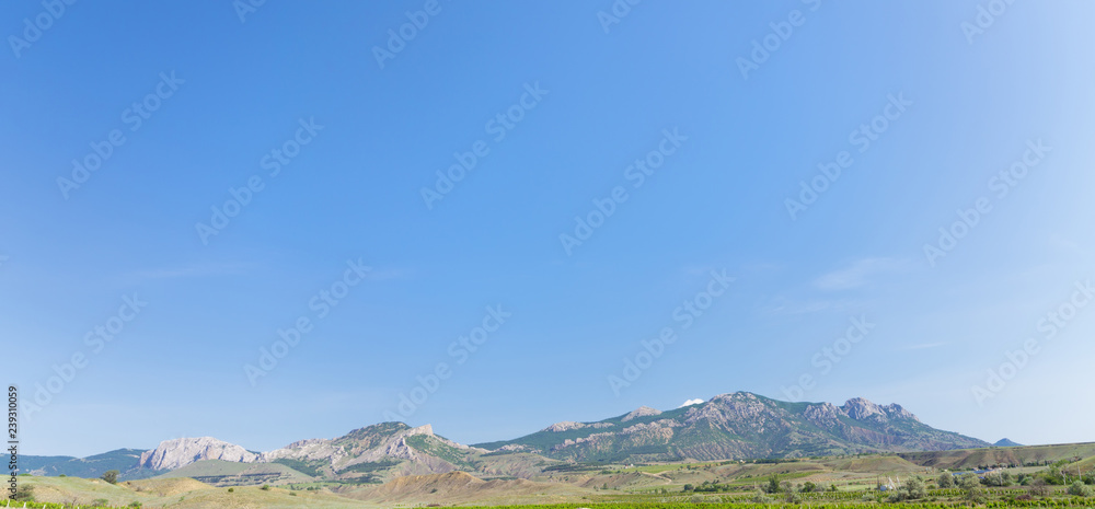 clear sky over the Sunny valley / hike around the Crimea panorama of mountain peaks
