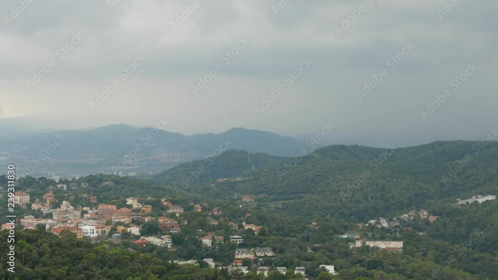 Valley village panorama in cloudy summer day, Barcelona Valley village panorama in cloudy summer day, Barcelona