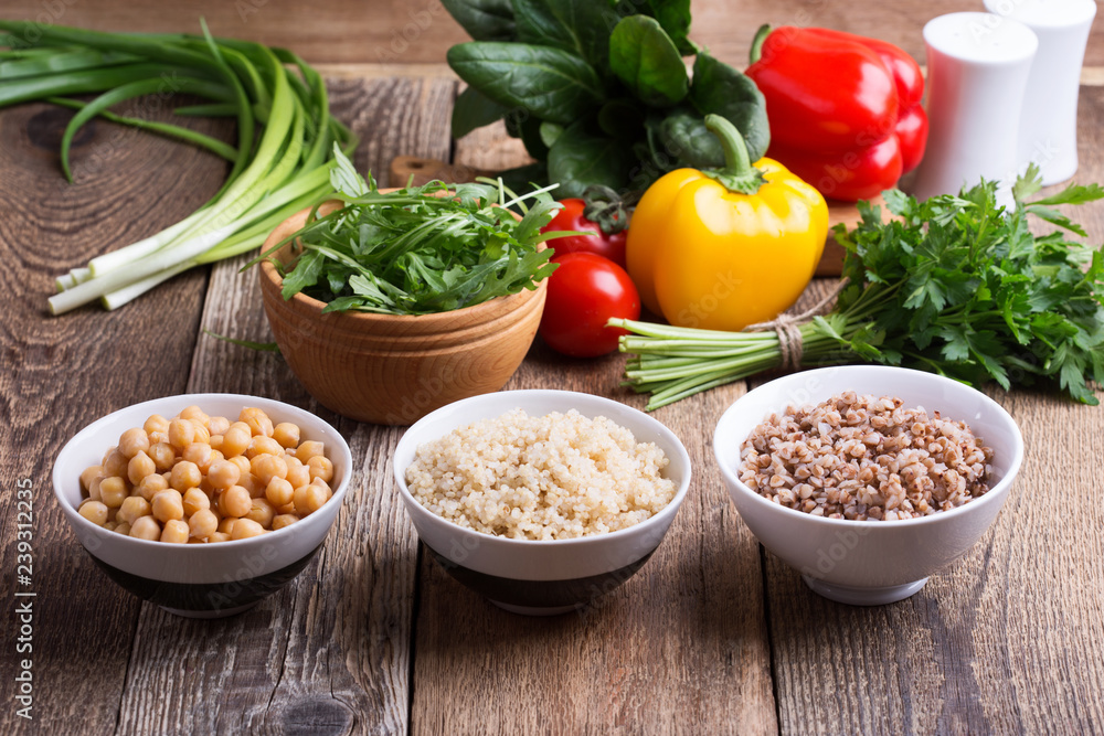 Selection of fresh vegetables and cooked cereal, grains and legume Selection of fresh vegetables and cooked cereal, grains and legume