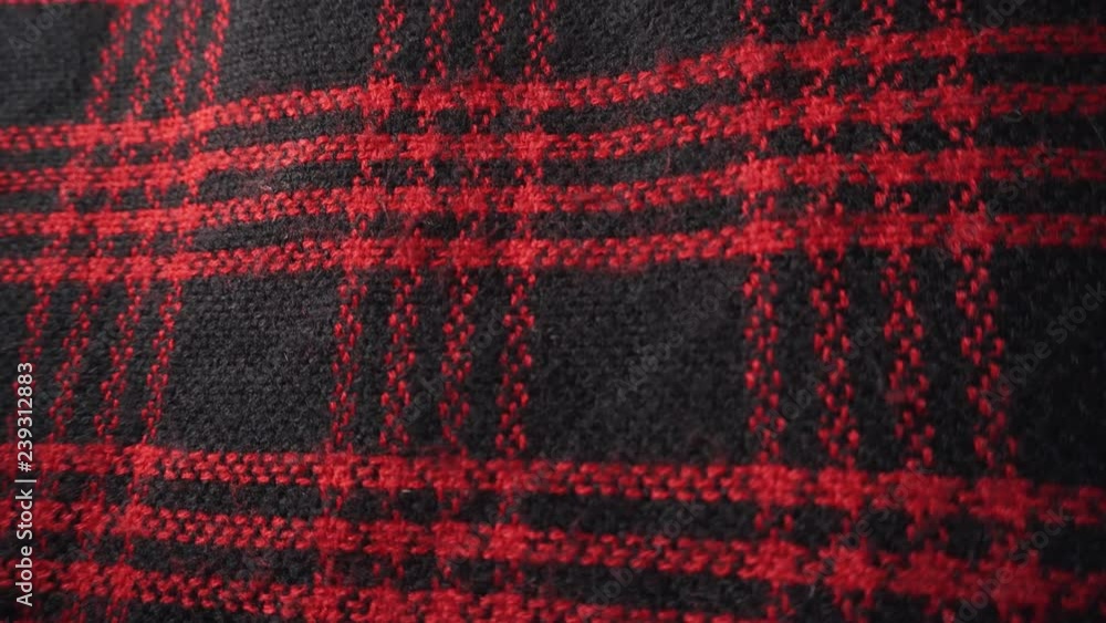 Checkered fabric texture, scarf or plaid. Red and black colors. Checkered fabric texture, scarf or plaid. Red and black colors.