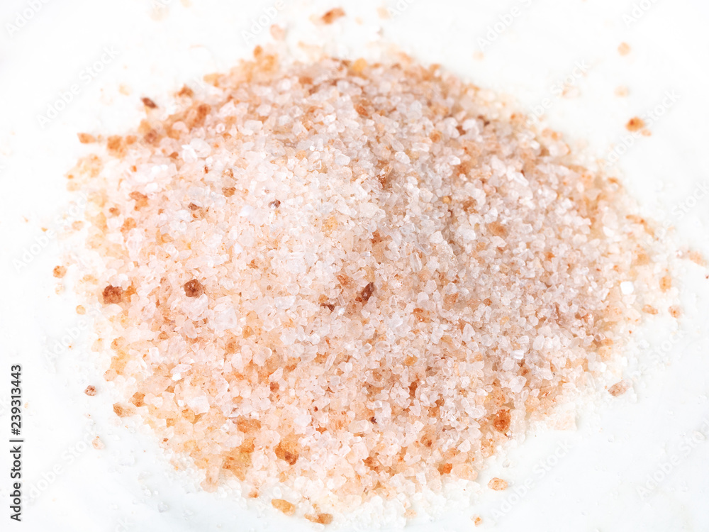 handful of ground pink himalayan salt on plate