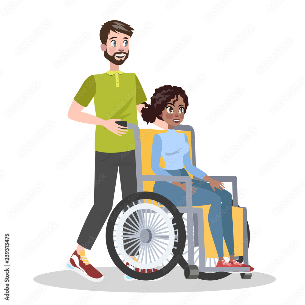 Volunteer help disabled person in a wheelchai