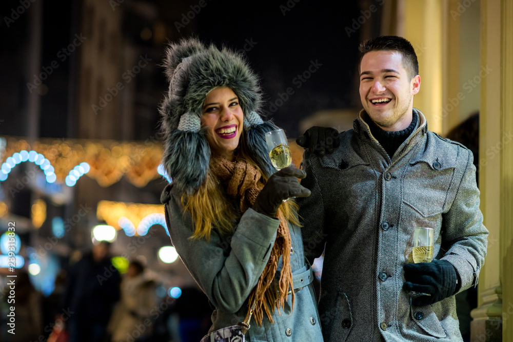 Lovely couple on a Christmas street