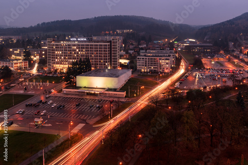 Evening autumn photography of cityscape of Zlin, Czech Republic, Europe with lights from cars taken from former industrial and current administrative bulding no. 21.