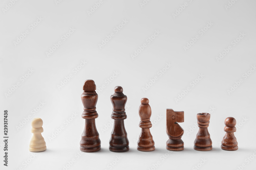 Chess pieces on light background Chess pieces on light background