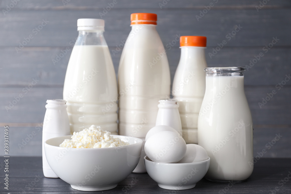 Different milk products on wooden table Different milk products on wooden table