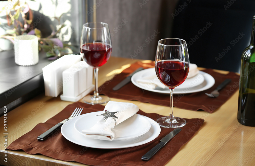 Table served for romantic date in restaurant Table served for romantic date in restaurant