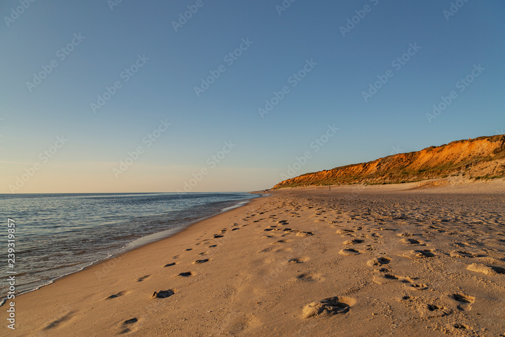 View to Red Cliff at Kampen Beach at Sunset at Sylt / Germany View to Red Cliff at Kampen Beach at Sunset at Sylt / Germany