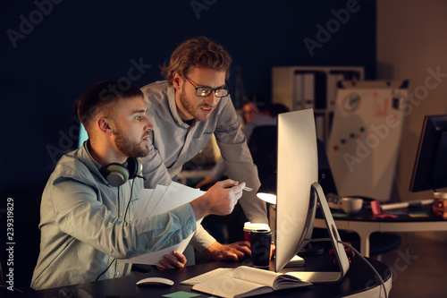 IT specialists working in o...