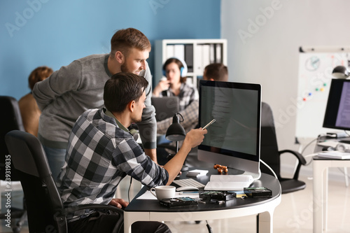 IT specialists working in office photo