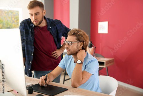 IT specialists working in o...